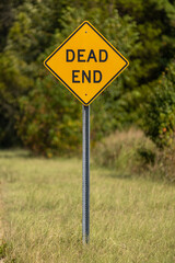 Obraz premium Caution road sign with trees in background