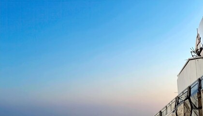 Whitewashed Building Against a Clear Twilight Sky
