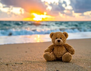 Teddy bear on a beach at sunrise
