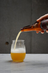 pouring a glass of beer