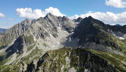Mountain peaks under a blue sky