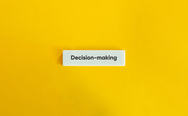 Decision-Making Text on White Letter Tile with Yellow Background