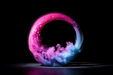 Abstract ring of pink and blue smoke with water droplets on a black background in studio lighting