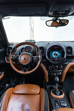 Mini Cooper Countryman full interior cockpit from behind, Modern crossover with brown leather


