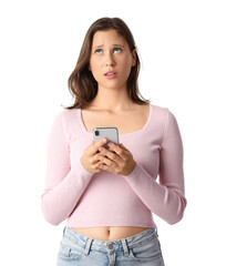 Beautiful young thoughtful woman with mobile phone isolated on white background