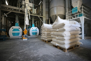 Flour bags in a mill stock image