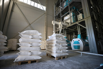 Flour bags in a mill stock image