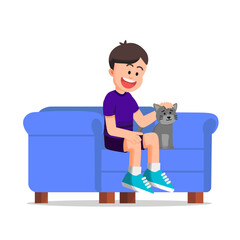 Cute boy sitting on a sofa with a cat beside him