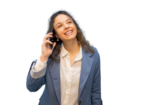 Professional woman smiling, holding smartphone during business conversation against white backdrop