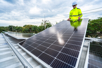 A skilled technician adjusts a solar panel on rooftop, emphasizing the transition to sustainable...