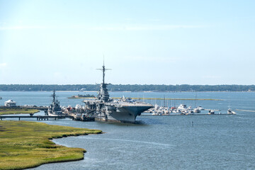 Fototapeta premium The warships of Patriots Point Naval & Maritime Museum, destroyer USS Laffey and aircraft carrier USS Yorktown, at the entrance to Charleston Harbor, SC, USA.