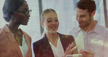 Viewing financial charts, business team collaborating in conference room with tablet and smartphone