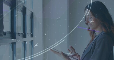 Businesswoman in blazer using tablet by office windows, with interface, copy space