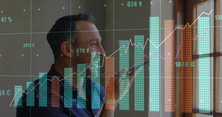 Speaking male professional holding smartphone near mouth at wooden window, with data charts overlay