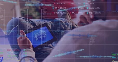 Male engineer holding tablet blueprint and swiping screen creating stock data overlays for analysis - Powered by Adobe