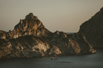 Sailboat Beneath the Golden Cliffs of Es Vedr&agrave;, Ibiza