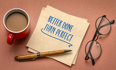 Better done than perfect - inspirational productivity note on a napkin