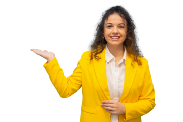 Young businesswoman wearing yellow jacket and white shirt is showing and presenting with open hand palm up, smiling and looking at camera on transparent background