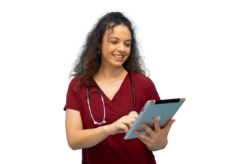 Young female doctor wearing burgundy scrubs and stethoscope, smiling and using digital tablet, isolated on transparent background
