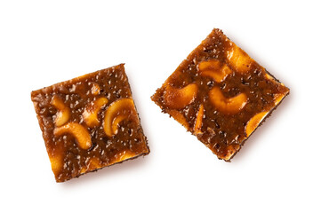 Brownie cake with nuts isolated on white background. top view