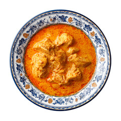 Butter chicken in a decorative bowl, top view, studio lighting, white background

