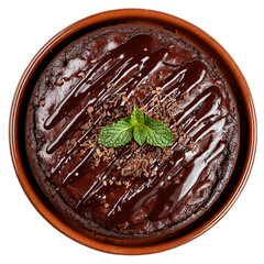 Decadent chocolate cake with chocolate glaze and mint garnish, served in a ceramic dish, top view studio shot
