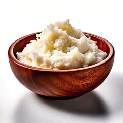 Creamy mashed potatoes in a wooden bowl