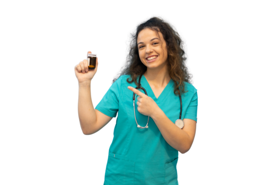 Female doctor wearing teal scrubs and stethoscope pointing at medicine bottle, recommending medication on transparent background