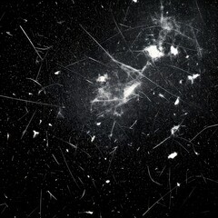 Abstract black and white image, featuring scattered light and streaks