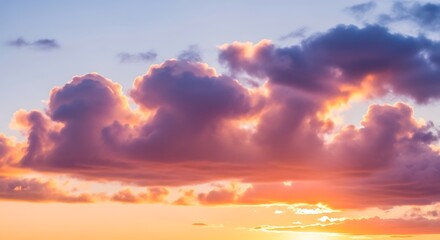 Obraz premium Sunset Clouds with Orange and Purple Hues.