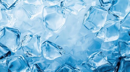 Obraz premium Close-up of crystal-clear ice cubes on a blue background