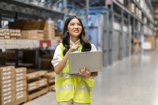 Female engineers discussing inventory in warehouse logistics and supply chain planning, operation management, data analysis, warehouse shipping, inventory tracking, optimization and technology