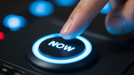 Pressing the glowing 'NOW' button, signifying action and immediate decision