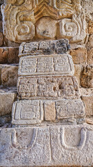 Stela base with hieroglyphs of a Serpent Head at the first level of the Acropolis, entrance of the tomb of Ukit Kan Leʼk Tokʼ,ruler of the Great Mayan city of Ek Balam,near Valladolid,Yucatan,Mexico