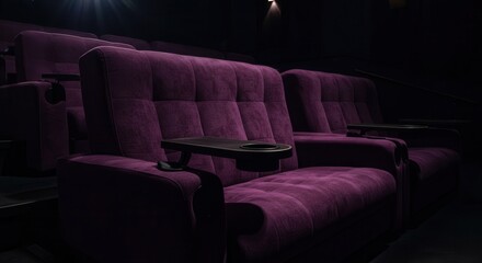 Obraz premium Deep purple velvet cinema seats, arranged in rows, create a comfortable and intimate -watching environment.