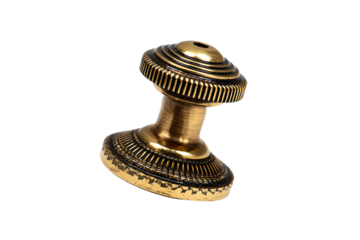 a gold knob on a white background