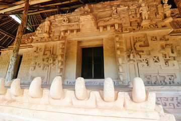Magnificent stucco façade and entrance to the tomb of Ukit  Kan Lek Tok through the jaws of a...