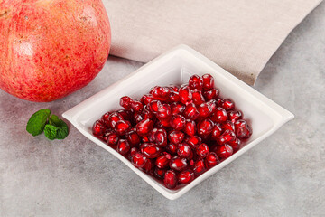 Ripe sweet red pomegranate seeds