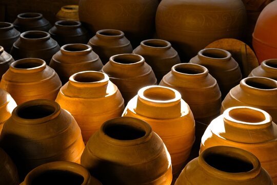 Big clay pots or pottery craft in the morning. Water dispenser, kendi, guci, gentong air or decoration for indoor or outdoor. Handmade, Indonesian product.