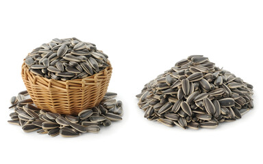 Sunflower seeds in a basket and pile isolated on white background