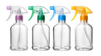Four assorted color trigger spray bottles for cleaning and household use transparent background