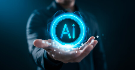 Artificial intelligence concept with businessman hand holding glowing AI icon on digital interface. Perfect for technology, innovation, future vision, automation, and smart solutions.