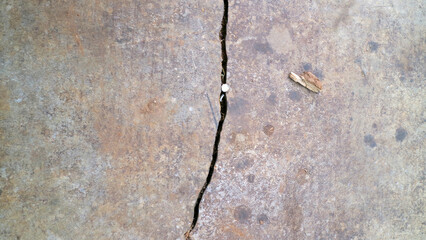 Cracked Concrete Surface with Pebble