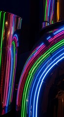 Vivid neon lights, mirrored curves, create an electrifying abstract design.