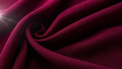 Elegant burgundy fabric with soft, flowing folds and a gentle sheen.