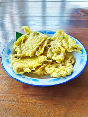 Authentic Indonesian Tempe Mendoan Served in a Traditional Setting