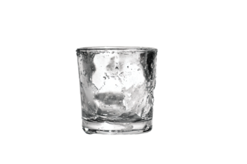a glass of water with ice on a white background
