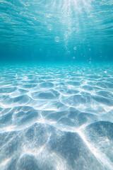 Fototapeta premium blue tropical ocean underwater with soft beige sand illuminated by clear sunlight patterns from above nature seascape landscape wallpaper background