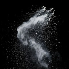 White powder explosion against black background (1)