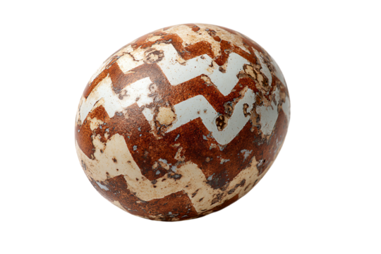 a brown and white egg with a cross pattern on it
